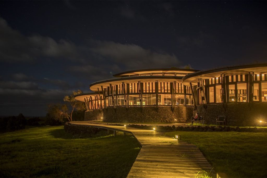 The outside of the Rapa Nui hotel at night