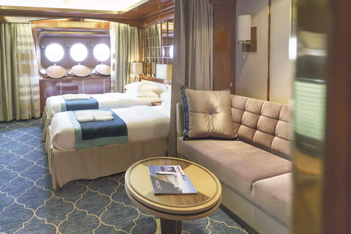 Main Deck Suite with Porthole Windows
